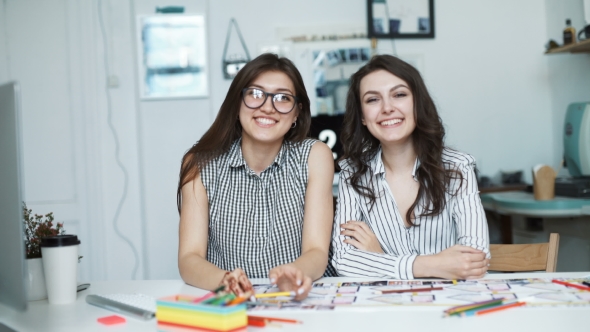 Two Women Working Together At An Architect Office alt
