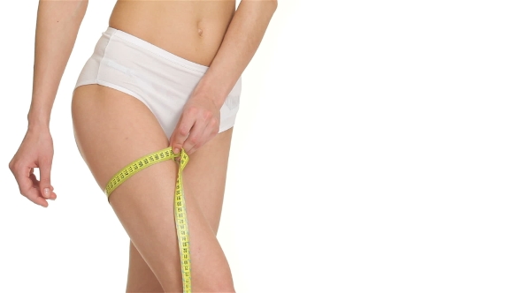  Of Woman Measures Her Leg alt