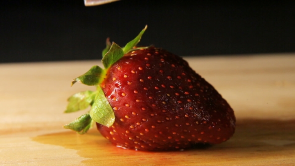 The Strawberry is Cut by Knife