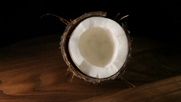 Half Of The Coconut On a Dark Background