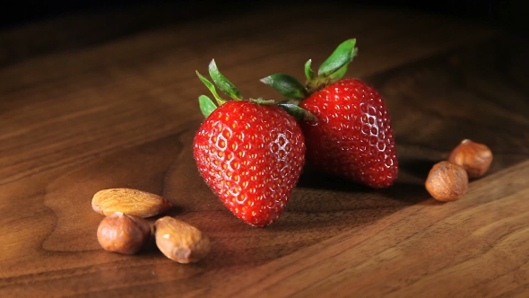Still Life  With Two Strawberries And Nuts