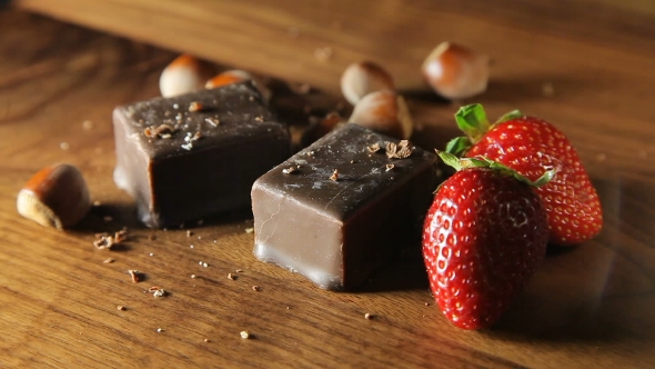 A beautiful arrangement of Chocolates, Strawberries And Nuts