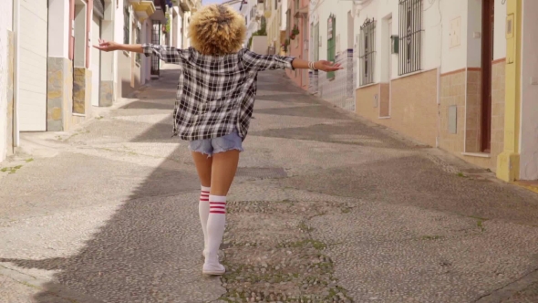 Model Walks The Mediterranean Street Along alt