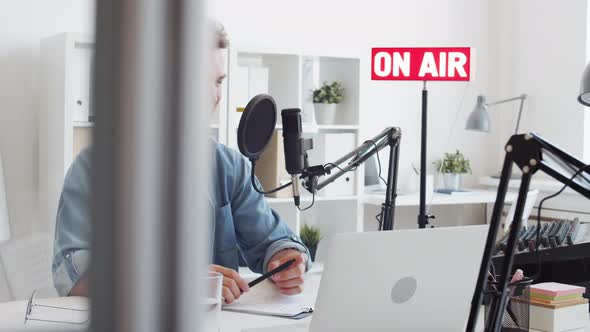 Radio Host Finishing Broadcast alt