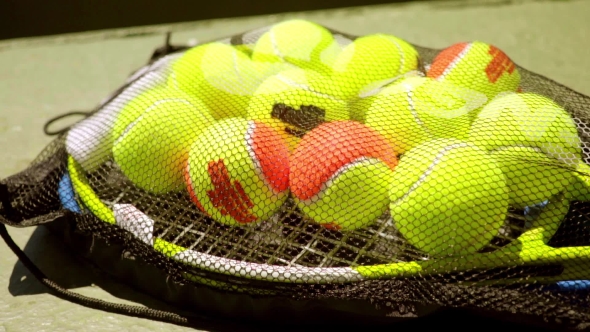 Net Bag Of Tennis Balls For Training On a Racket alt