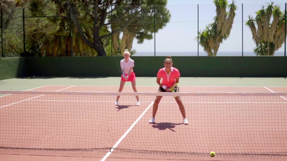 Two Young Woman Tennis Doubles Players alt