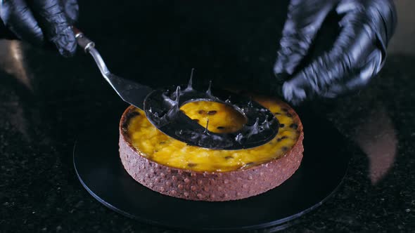 Closeup of Chef is Making Dessert with Passion Fruit