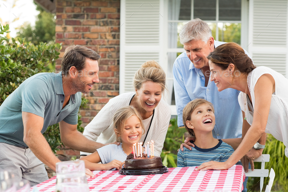 Family enjoying birthday party - Stock Photo - Images