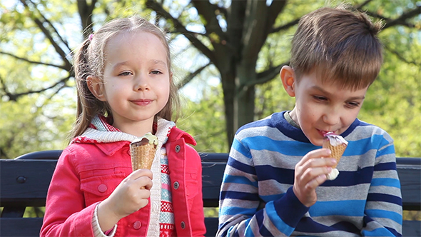 Happy Children Eating Ice Cream
