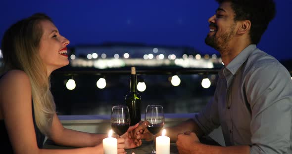 Beautiful Couple in Love Having Romantic Dinner at Night alt