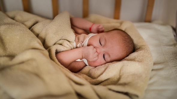 Baby Sleeping In Bed alt
