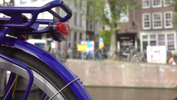Bicycle and Morning Traffic on the Amsterdam Waterfront in Defocus