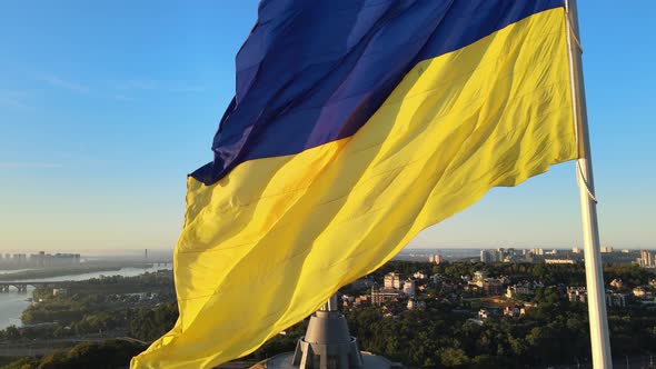Ukrainian Flag in the Morning at Dawn. Aerial. Kyiv. Ukraine alt