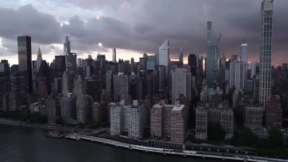 The Midtown East cityscape on a gloomy evening in New York, USA - Aerial view alt