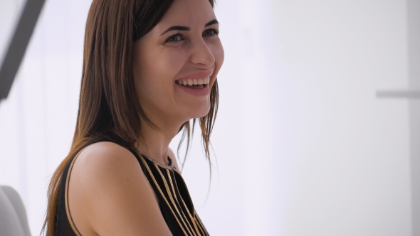 Beautiful Happy Woman Indoors Laughing alt
