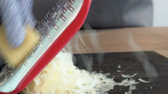  Parmesan Cheese Being Grated alt
