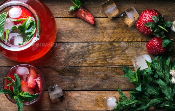 Homemade strawberry mint lemonade served with fresh berries