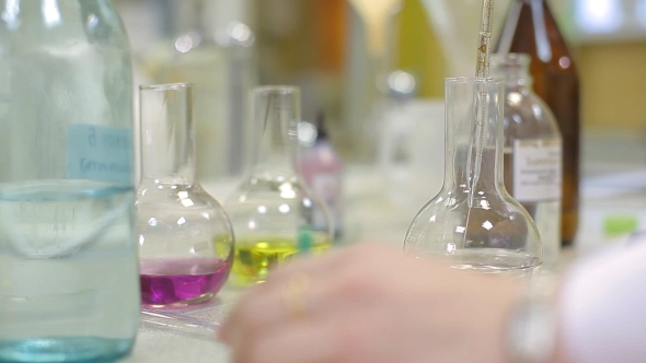 A Technician is Checking the Quality of Water alt