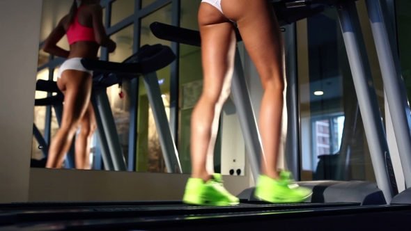  Beautiful Woman's Legs On Treadmill