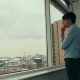 Businessman Thinking And  Looking Out His Window In His Office - VideoHive Item for Sale