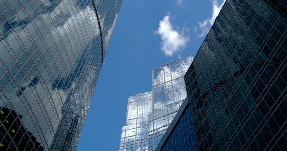 Corporate Buildings And  Clouds Fast