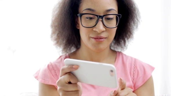 Happy African Woman With Smartphone At Home 28 alt