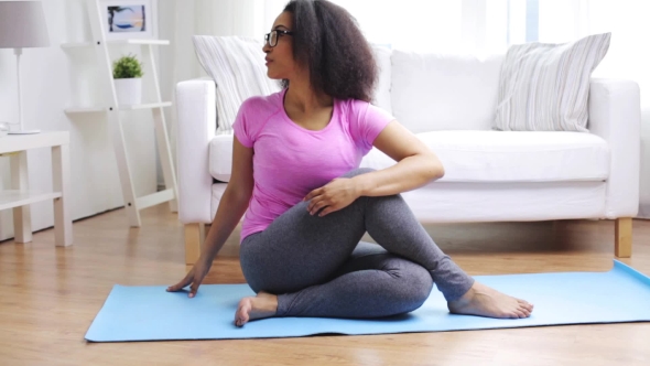 Happy African Woman Exercising On Mat At Home 65 alt
