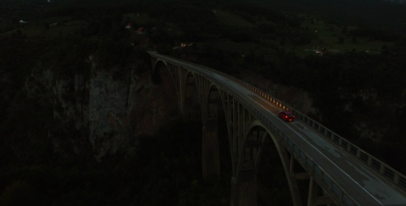 Aerial Night View of Bridge and Car