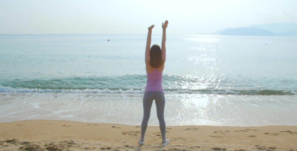 Young Woman on Her Workout on the Beach