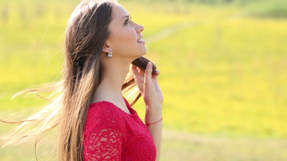 Young Girl Walking In The Fresh Air Enjoying Nature