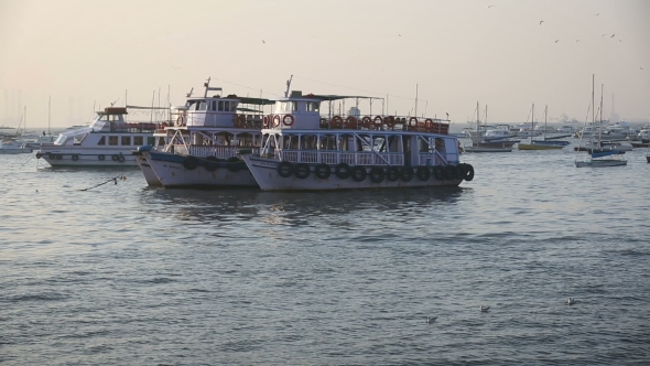 Tourist And Fisher Boats By The Harbour alt