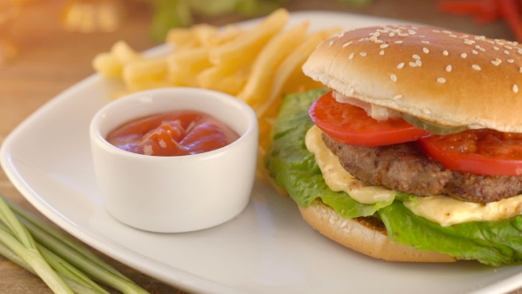 Burger With French Fries And Ketchup
