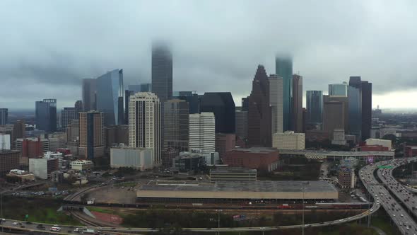 This video is about an aerial of downtown Houston on a rainy and cloudy day. This video was filmed i alt