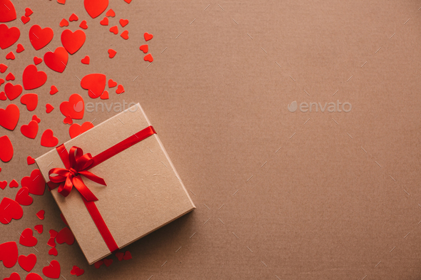 Heart background. Valentines day. Abstract paper hearts and gift box with  red ribbon. Stock Photo by MediaGroupBestForYou