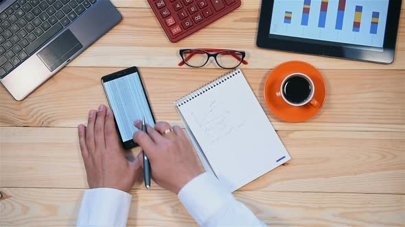 Broker Working On Mobile Phone alt