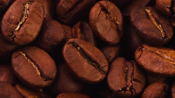 Closeup Shot of Aromatic Roasted Whole Coffee Beans As a Natural Background alt