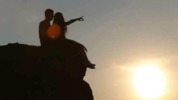 Beautiful Young Couple In Love Kiss In The Sun