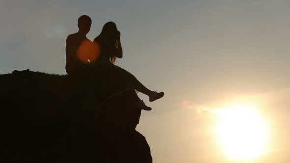 Beautiful Young Couple In Love Kiss In The Sun