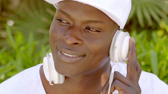 Attractive African Man Listening To Music alt