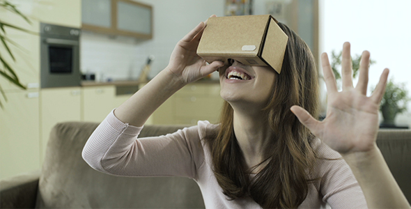 Girl Using Cardboard VR Headset