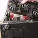 Caucasian Hand Trying to Fit a New Big Black Triple Fan Graphics Card Into Black Pc Case Card Does - VideoHive Item for Sale