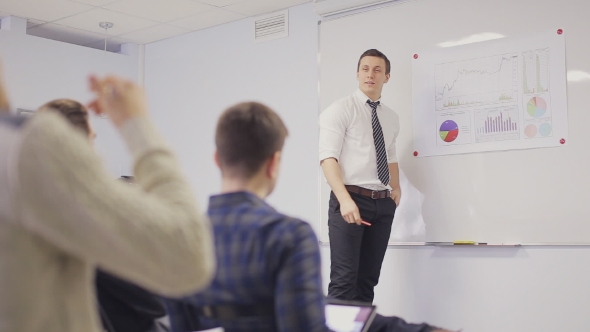 Businessman Presenting  In The Boardroom