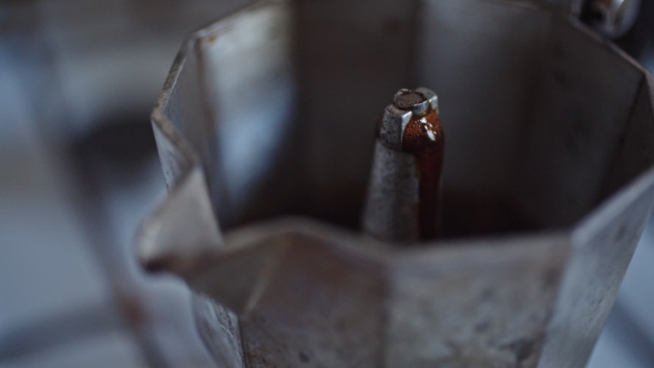 Process Of Making Espresso In The Coffee Maker alt