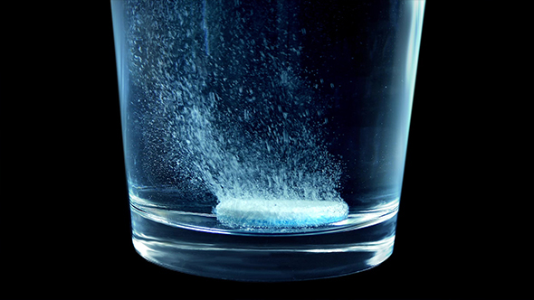 Medicine Tablet Fizzes In Glass alt