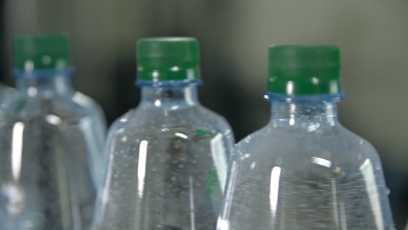 A Line For Bottling Mineral Water Into Bottles alt