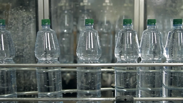 A Line For Bottling Mineral Water Into Bottles alt