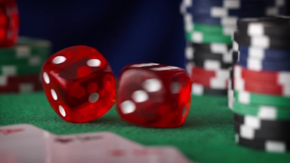 Red Dice Rolls, Casino Chips, Cards On Green Felt
