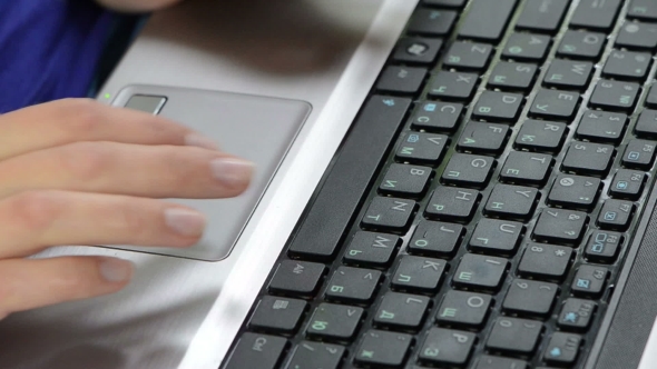 Woman Hands Typing Text On Laptop Keyboard And Touching Touchpad