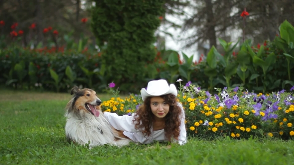 Girl With Dog Posing For Photos