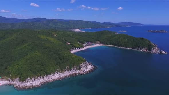 Aerial Shot of Exotic Tropical Ocean Coast on Sunny Day alt